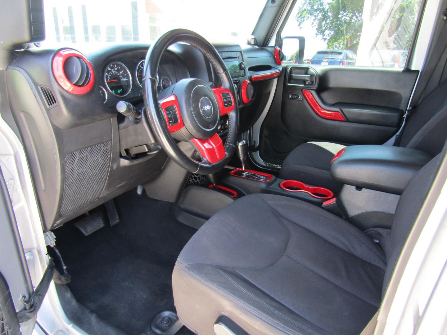 2013 Silver Jeep Wrangler Unlimited Sport 4WD (1C4BJWDG2DL) with an 3.6L V6 DOHC 24V FFV engine, Automatic transmission, located at 15016 S Hwy 231, Midland City, AL, 36350, (334) 983-3001, 31.306210, -85.495277 - Photo#3